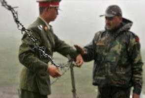 China plays down border frictions with India