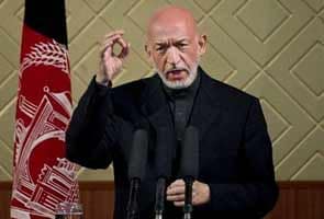 Afghanistan President Hamid Karzai seeks Indian military aid amid Pakistan row