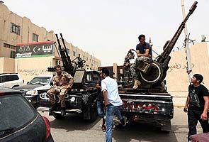 Libya gunmen surround justice ministry in Tripoli