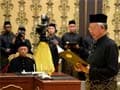 Najib Razak sworn-in as Malaysia's PM, opposition cries foul