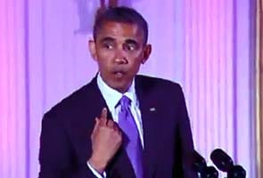 Barack Obama explains the lipstick stain on his shirt collar
