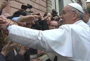 Pope to visit Brazil slum, meet prisoners, on first trip