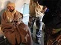Muammar Gaddafi's son Saif al-Islam appears briefly in court