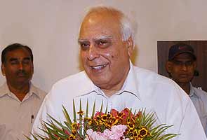 Kapil Sibal takes charge as Union Law Minister