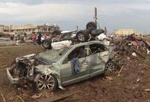 Rescuers search Oklahoma tornado town ruins as recovery starts