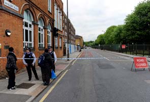 Man hacked to death in London street in suspected militant attack