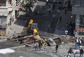 Tear gas and lemon juice in the battle for Taksim Square