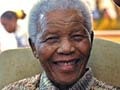 Former South African president says Nelson Mandela improving