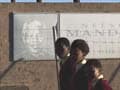 Nelson Mandela on life support, uneasy wait for South Africa