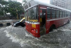 Heavy rains lash Mumbai; local train services affected 