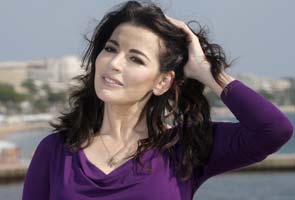 Nigella Lawson moves out with her children, husband cautioned by police for assault