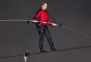 US daredevil Nik Wallenda becomes first man to cross Grand Canyon on tightrope