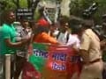 Protesters chant pro-Narendra Modi slogans outside Advani's house