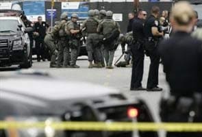 Gunman shot dead by police after six die in California shooting spree