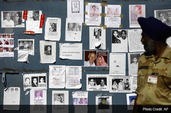 Uttarakhand: At Dehradun airport, wall plastered with hundreds of photographs of those missing 