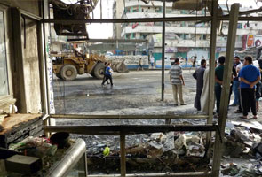 Toll in Baghdad suicide bombs up to 31 dead: officials