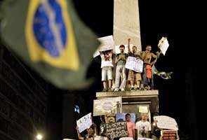 One killed as more than a million protest in Brazil