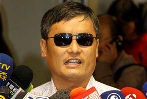 Chinese activist Chen Guangcheng warns Beijing against suppression