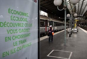 France gripped by travel chaos as rail, air strikes intensify