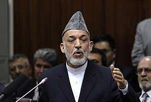 Hamid Karzai suspends talks with US over Taliban move 