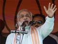 In first rally as BJP campaign chief, Narendra Modi hits out at 'dual power centre' in government