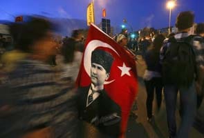 Thousands of Turks defy Prime Minister's call for end to protest