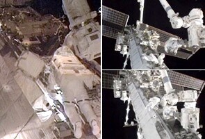 Spacewalkers leave space station for outside chores