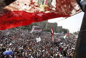 Infighting threatens Egypt transition plan, army orders arrests of Muslim Brotherhood leaders