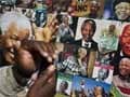 World pays tribute as "improving" Nelson Mandela turns 95