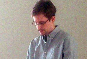 'Find a safe haven,' father tells Edward Snowden in Russia