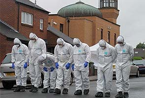 UK police investigate explosion near mosque
