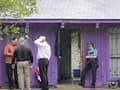 Grandson arrested after four elderly men found in squalid Texas home