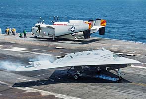 US drone X-47B lands on carrier deck in historic flight