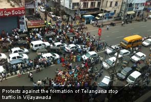 Protests against Telangana escalate, four ministers submit resignations 