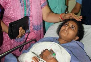 Woman shot at after she took on chain snatchers in Delhi