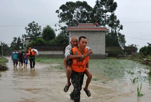 China rain, landslides leave 28 dead, 66 missing