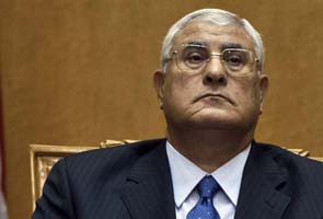 Egypt's interim head of state Adli Mansour dissolves parliament