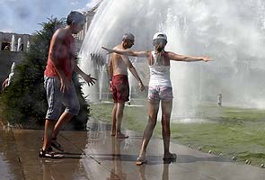 Grass fires break out in London as heat wave bakes Britain