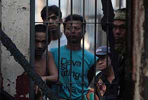 Indonesian police hunt 131 in prison breakout