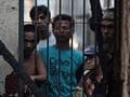 Indonesian police hunt 131 in prison breakout