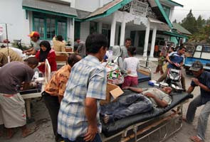 Indonesia earthquake: Six children among 11 dead, 14 trapped in mosque collapse