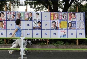 Japan PM's coalition gets majority in upper house: exit polls