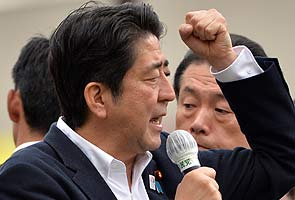 Japan Prime Minister Shinzo Abe set to win upper house majority: polls