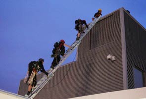 Women protesters scale London's Shard skyscraper