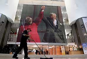 Millions stand at vigil to honour Nelson Mandela's legacy