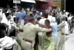 Caught on camera: Madhya Pradesh police official thrashes woman protester