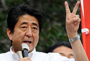 Japan's ruling bloc wins upper house elections 