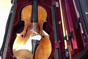 Stolen Stradivarius violin, worth 1.2 million pounds, recovered in Britain after three years