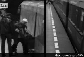 Woman 'miraculously' walks off after falling under subway train