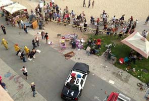 One killed as car plows into busy US seaside boardwalk